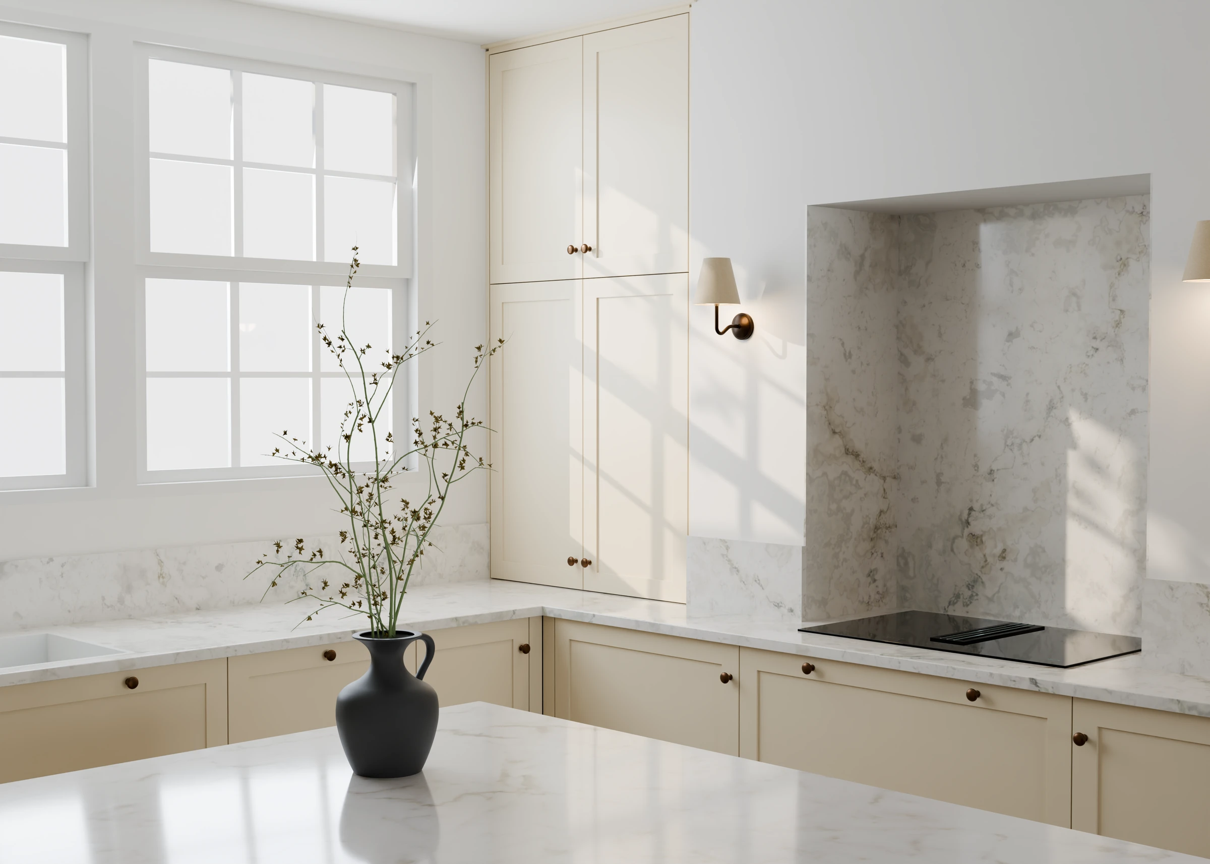 Cream kitchen cabinetry and marble worktops